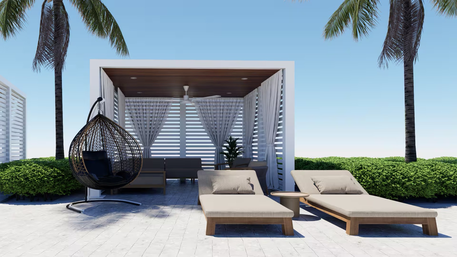 Reference: a second view of cabanas and beach loungers along the lagoon.